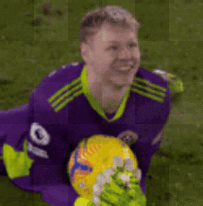 A Soccer Player Wearing A Purple Jersey With The Number 9 On The Sleeve GIF