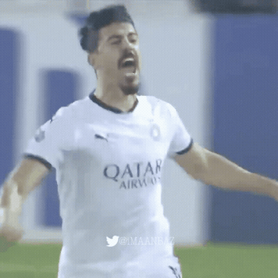 A Soccer Player Wearing A Qatar Airlines Jersey Is Celebrating GIF