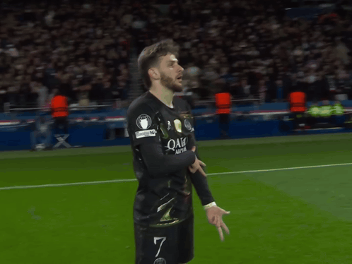 A Soccer Player Wearing A Qatar Airways Jersey Is Running On The Field GIF