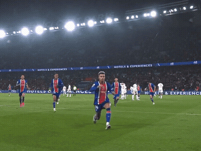 A Soccer Player Wearing A Qatar Shirt Is Kneeling On The Field GIF