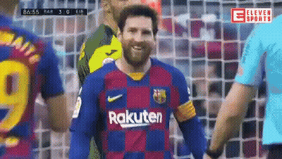 A Soccer Player Wearing A Rakuten Jersey Is Smiling While Standing Next To A Referee . GIF