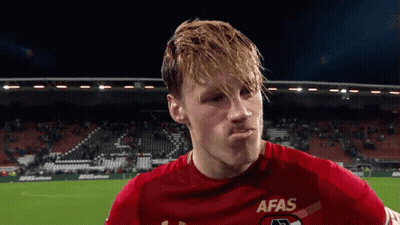 A Soccer Player Wearing A Red Afas Jersey GIF