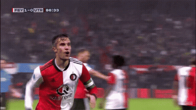 A Soccer Player Wearing A Red And White Jersey That Says Current Is Running On The Field GIF