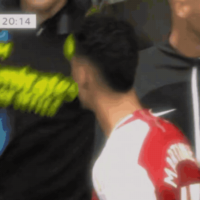A Soccer Player Wearing A Red And White Jersey With The Name Martin On The Back GIF