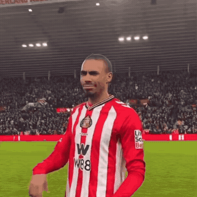 A Soccer Player Wearing A Red And White Striped Jersey With W88 On The Front GIF