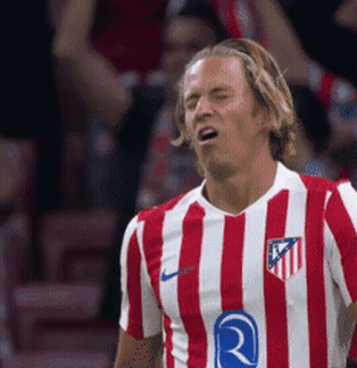A Soccer Player Wearing A Red And White Striped Shirt With The Letter R On It GIF