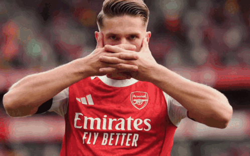 A Soccer Player Wearing A Red Emirates Fly Better Shirt GIF