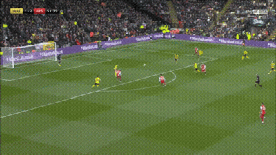 A Soccer Player Wearing A Red Jersey That Says Emirates Fly Emirates On It GIF