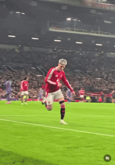 A Soccer Player Wearing A Red Jersey With A United Logo On It GIF