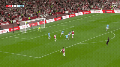 A Soccer Player Wearing A Red Jersey With Emirates On It GIF