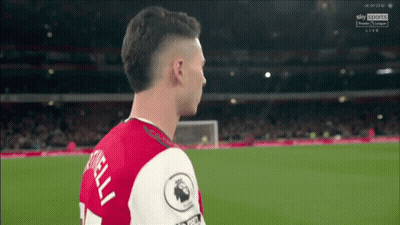 A Soccer Player Wearing A Red Jersey With The Number 1 On The Back GIF