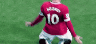 A Soccer Player Wearing A Red Jersey With The Number 10 On The Back Is Kneeling Down On The Field . GIF