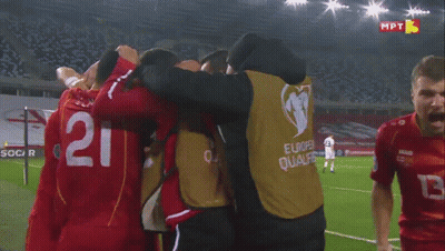 A Soccer Player Wearing A Red Jersey With The Number 13 On It GIF
