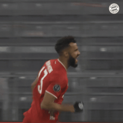 A Soccer Player Wearing A Red Jersey With The Number 14 On It GIF