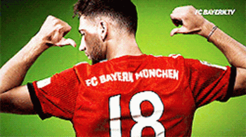 A Soccer Player Wearing A Red Jersey With The Number 18 On It GIF