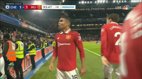 A Soccer Player Wearing A Red Jersey With The Number 18 On It GIF