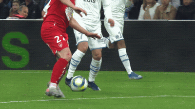 A Soccer Player Wearing A Red Jersey With The Number 2 On It GIF