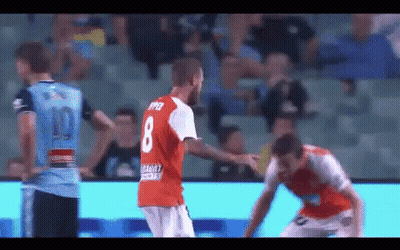 A Soccer Player Wearing A Red Jersey With The Number 8 On The Back GIF