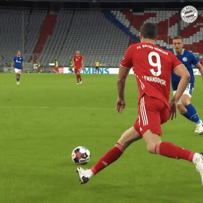A Soccer Player Wearing A Red Jersey With The Number 9 On It GIF