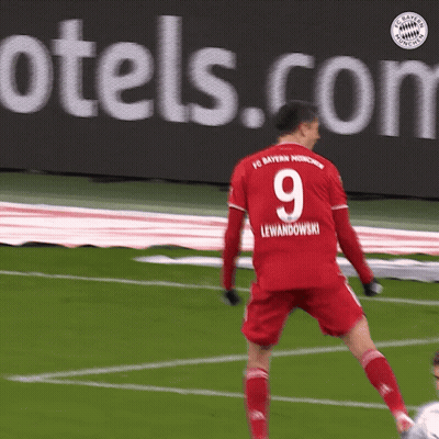 A Soccer Player Wearing A Red Jersey With The Number 9 On It GIF