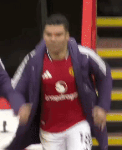 A Soccer Player Wearing A Red Shirt That Says ' Adidas ' On It GIF