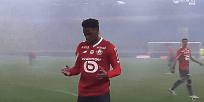 A Soccer Player Wearing A Red Shirt That Says Boulanger On It GIF