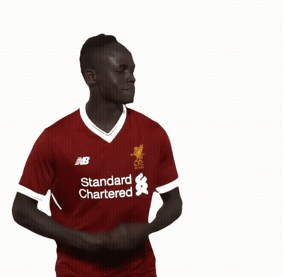 A Soccer Player Wearing A Red Shirt That Says New Balance On It GIF
