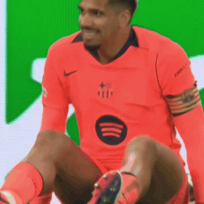 A Soccer Player Wearing A Red Shirt With A Spotify Logo On It GIF