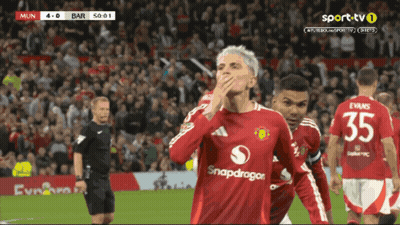 A Soccer Player Wearing A Red Shirt With Snapdragon On It GIF