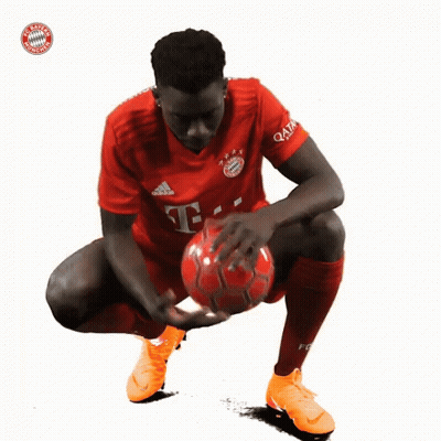 A Soccer Player Wearing A Red Shirt With The Letter T On The Front GIF