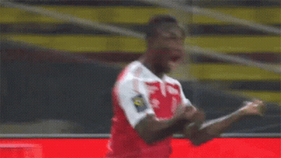A Soccer Player Wearing A Red Shirt With The Number 10 On The Back GIF