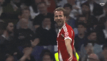 A Soccer Player Wearing A Red Shirt With The Number 13 On It GIF