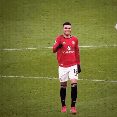 A Soccer Player Wearing A Red Shirt With The Number 7 On It GIF