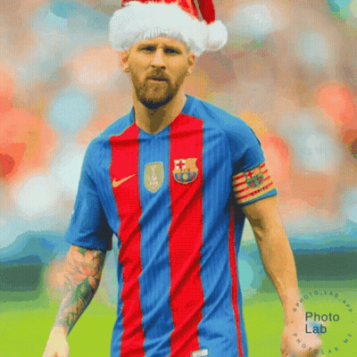 A Soccer Player Wearing A Santa Hat And A Fc Barcelona Shirt GIF