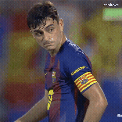 A Soccer Player Wearing A Shirt That Says Ambilight Is Standing In The Rain . GIF