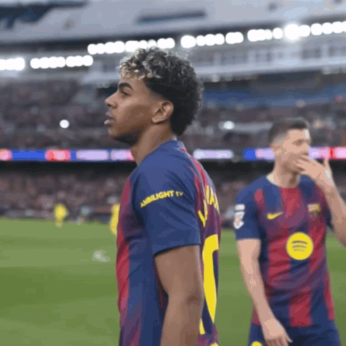A Soccer Player Wearing A Shirt That Says ' Amblight ' On The Sleeve GIF