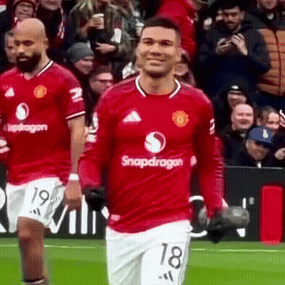 A Soccer Player Wearing A Snapdragon Jersey Is Smiling GIF