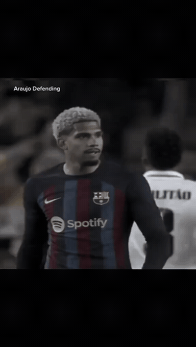 A Soccer Player Wearing A Spotify Shirt Salutes The Crowd GIF