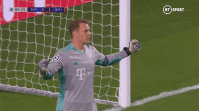 A Soccer Player Wearing A T-Mobile Jersey Stands In Front Of A Goal GIF