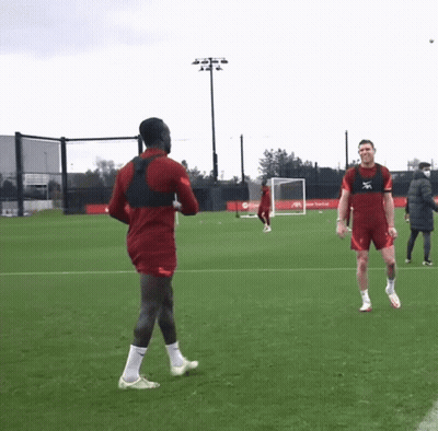 A Soccer Player Wearing A Vest That Says ' X ' On It GIF