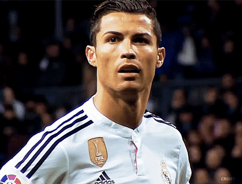A Soccer Player Wearing A White Adidas Jersey GIF
