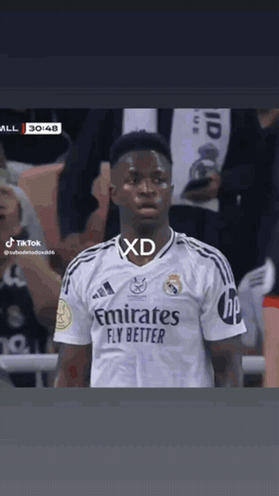 A Soccer Player Wearing A White Emirates Fly Better Jersey GIF