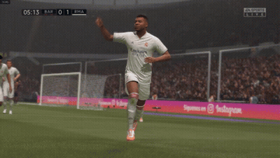 A Soccer Player Wearing A White Emirates Jersey Runs On The Field GIF