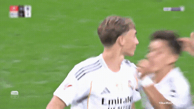 A Soccer Player Wearing A White Emirates Shirt GIF