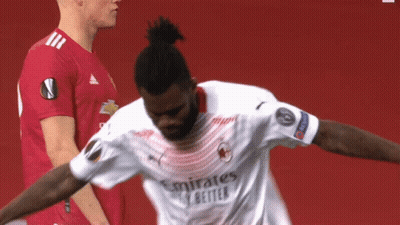 A Soccer Player Wearing A White Emirates Shirt GIF