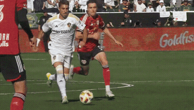 A Soccer Player Wearing A White Jersey That Says Herbalife GIF