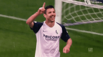 A Soccer Player Wearing A White Jersey That Says Rico On It GIF