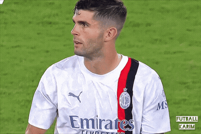 A Soccer Player Wearing A White Jersey With Emirates Written On It GIF