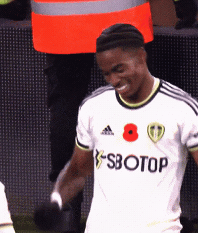 A Soccer Player Wearing A White Jersey With Sbotop Written On It GIF