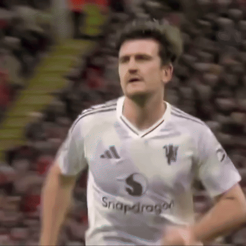 A Soccer Player Wearing A White Jersey With Snapdragon On The Front GIF